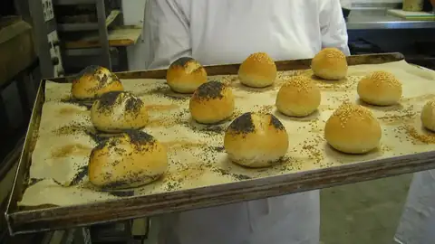Tray of freshly baked bread rolls